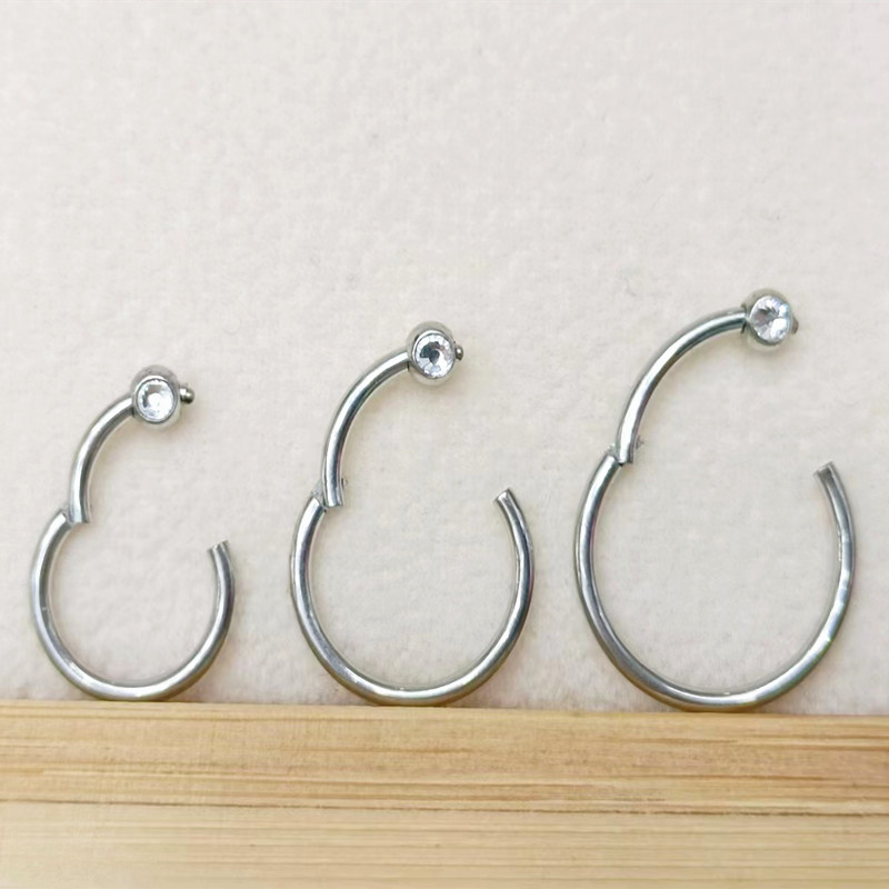 50pcs/lot 316 Surgical Steel G - Clicker Ring Seamless review and price